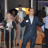 An alumnus speaking to all of the alums